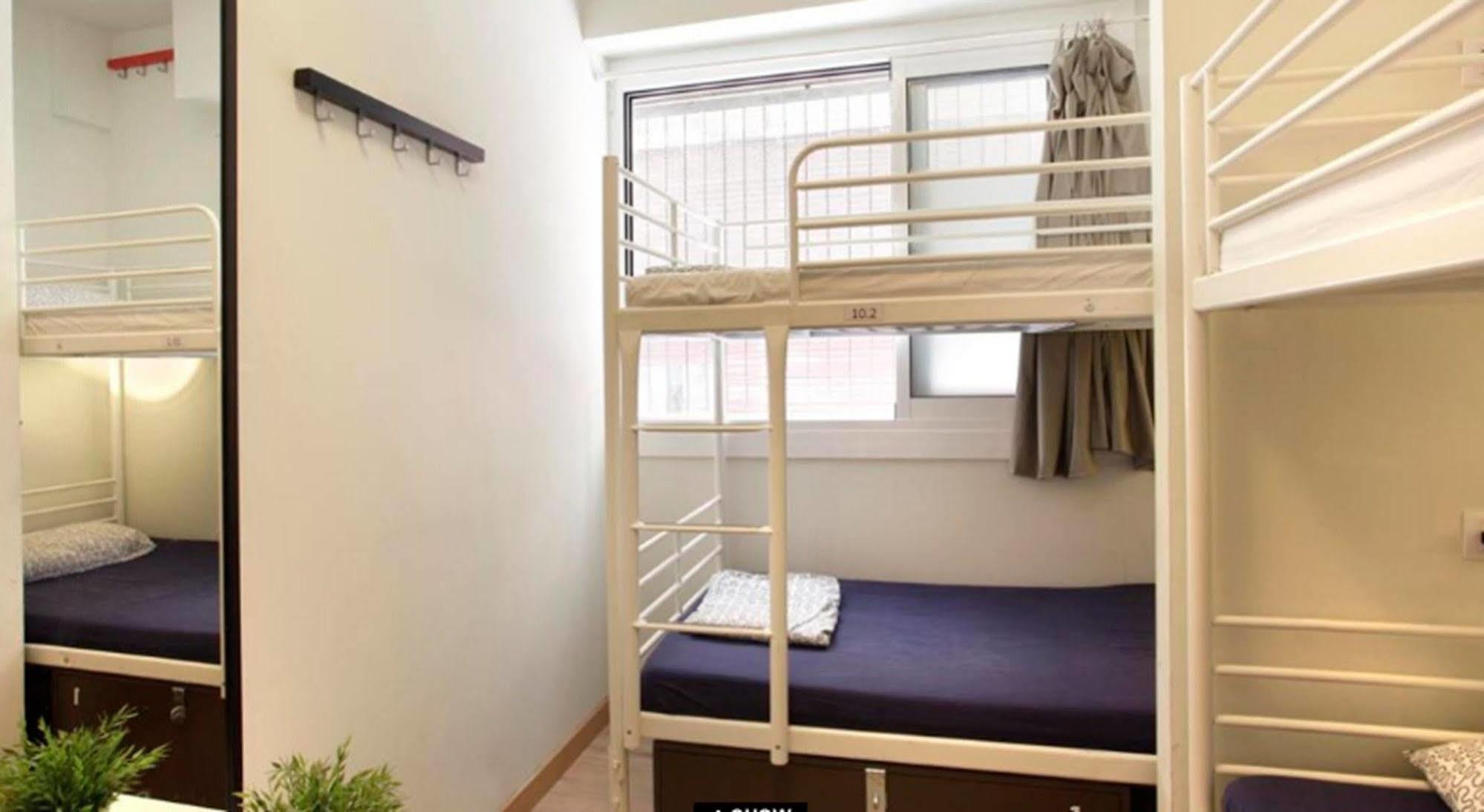 Gracia City Hostel Barcelona Exteriör bild A capsule hotel room in Japan
